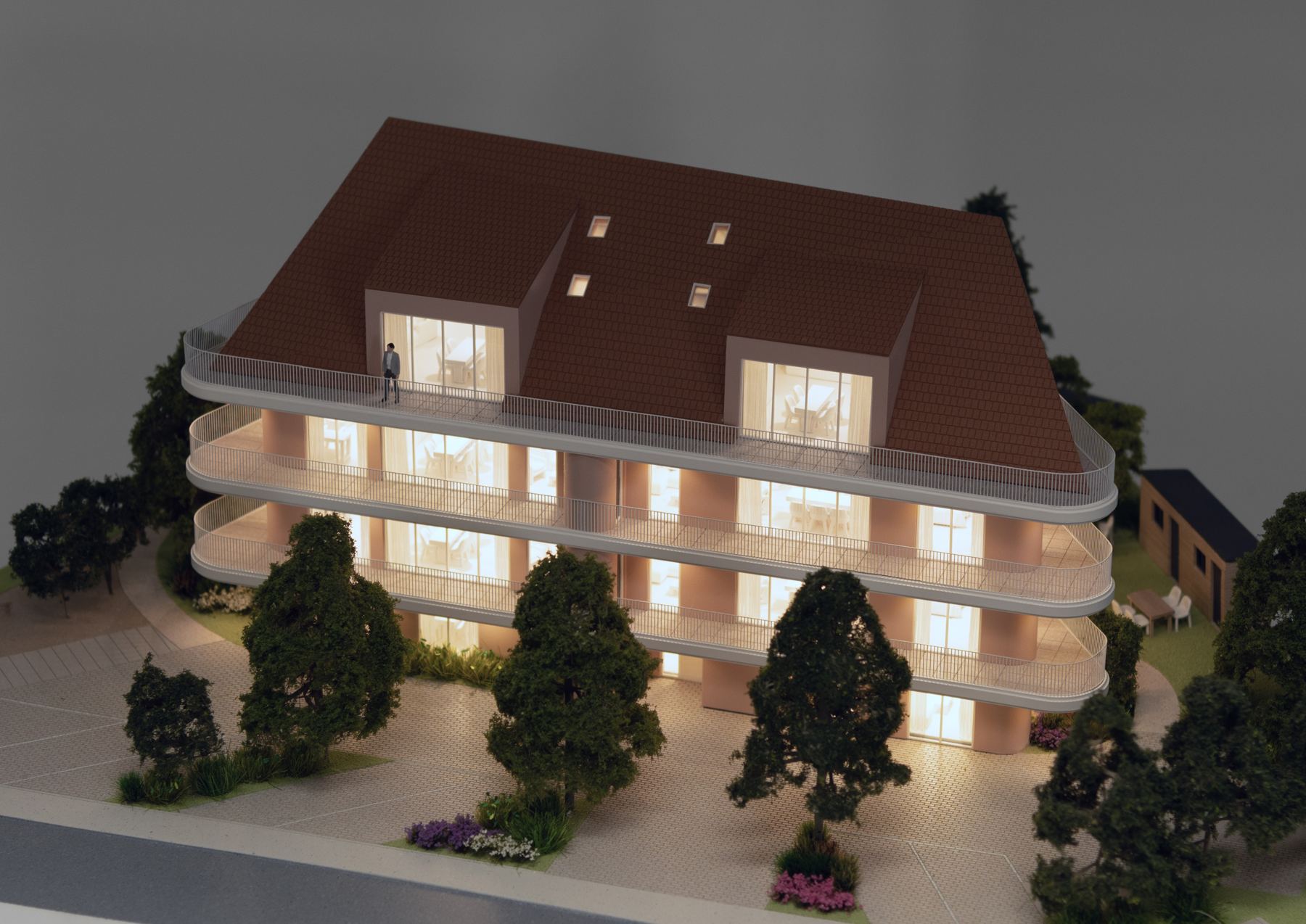 Maquette d’immeuble résidentiel éclairée de l’intérieur, réalisée pour le Groupe Bernard Nicod